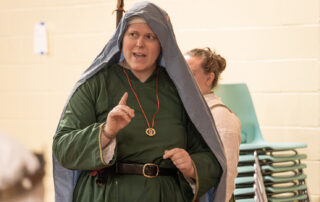 Armiger Acelyn of Ben Dunfirth addresses the populace during a court